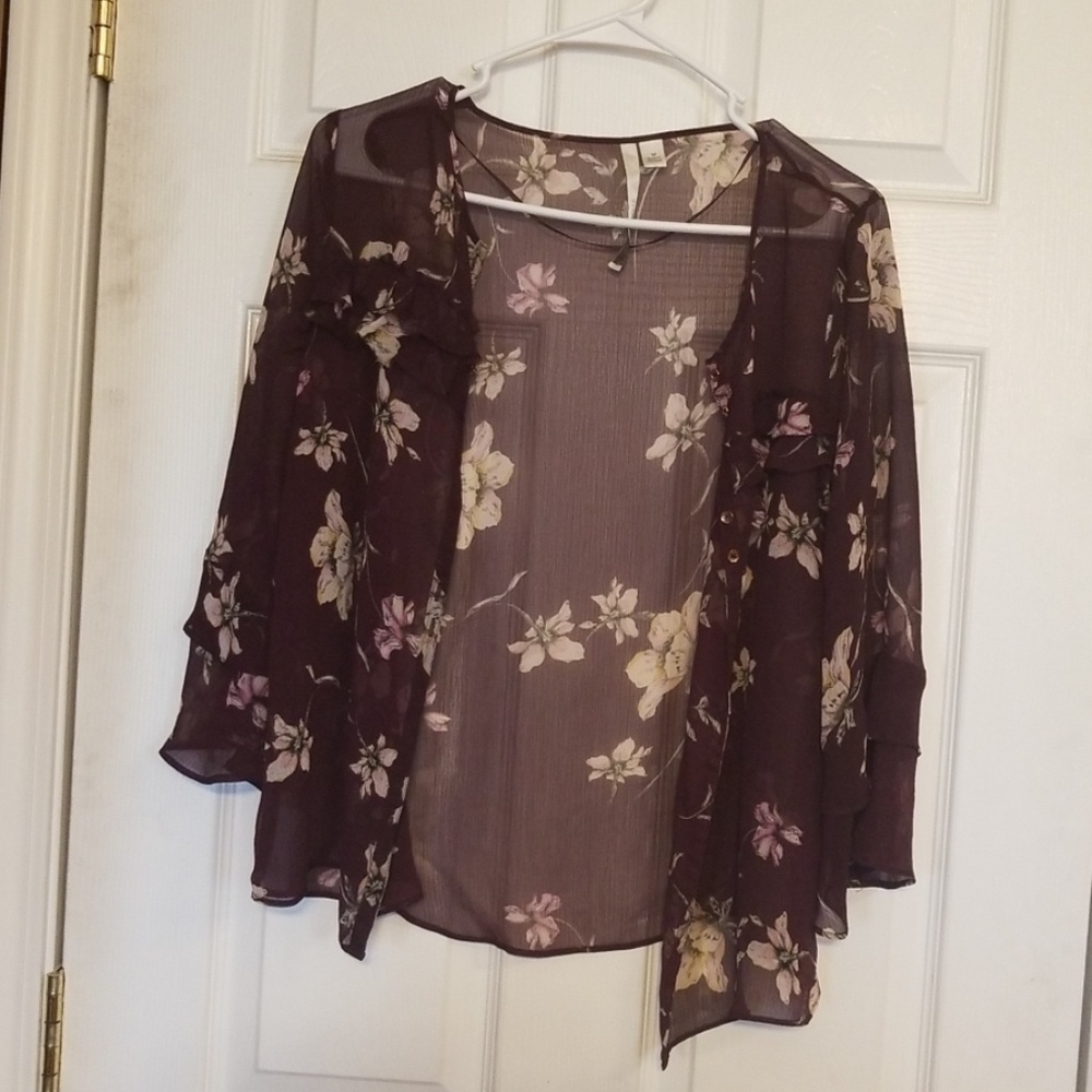 I am selling a beautiful dress shirt with flowers